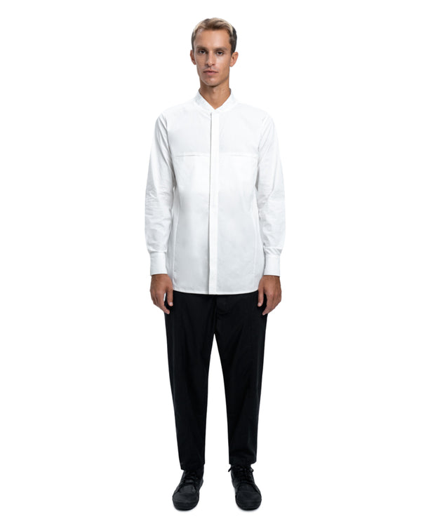 Arma button up long sleeve shirt made from durable stretchy cotton. Two front pockets on the chest, decorated with banded collar.