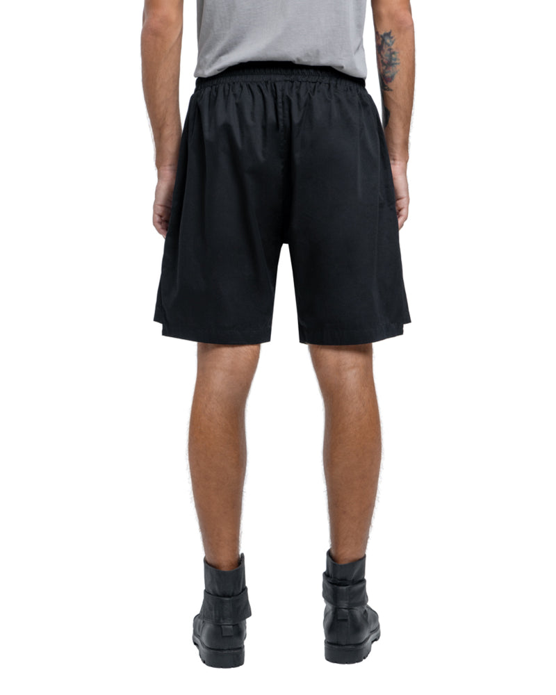 Asymmetric pocket shorts in black